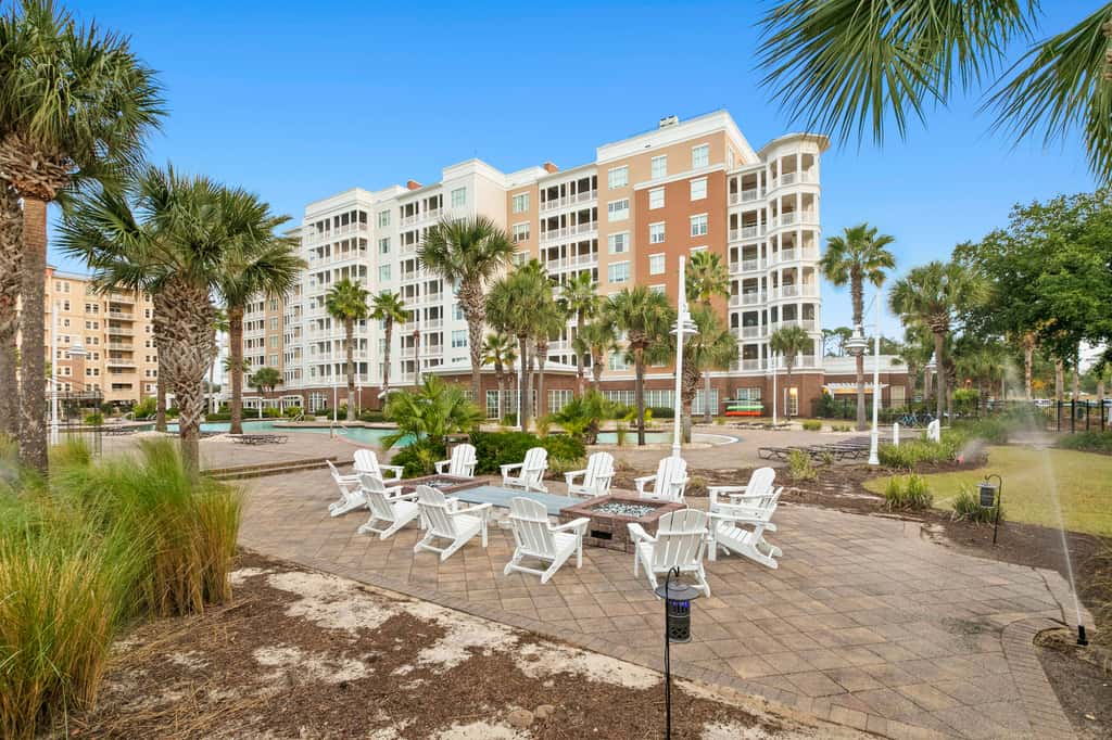 3rd-floor beach & pool-view condo with outdoor pool, hot tub, grills, balcony