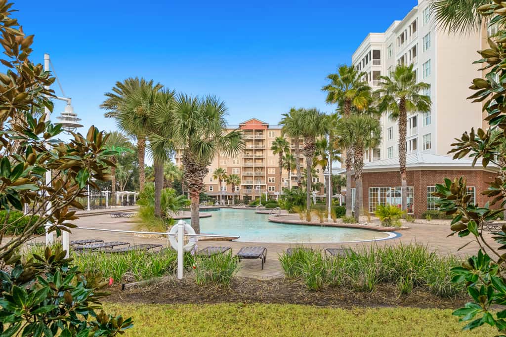 3rd-floor beach & pool-view condo with outdoor pool, hot tub, grills, balcony