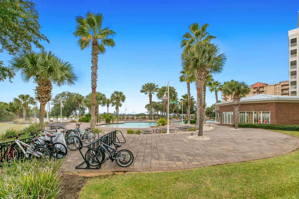 3rd-floor beach & pool-view condo with outdoor pool, hot tub, grills, balcony