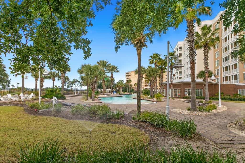3rd-floor beach & pool-view condo with outdoor pool, hot tub, grills, balcony