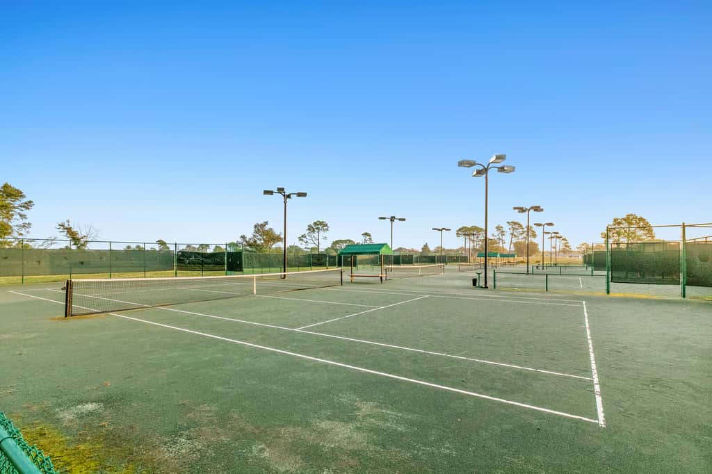 3rd-floor beach & pool-view condo with outdoor pool, hot tub, grills, balcony