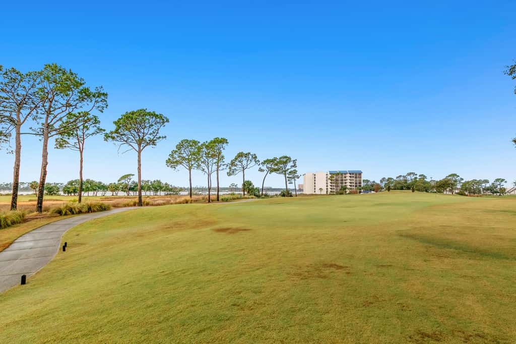 3rd-floor beach & pool-view condo with outdoor pool, hot tub, grills, balcony