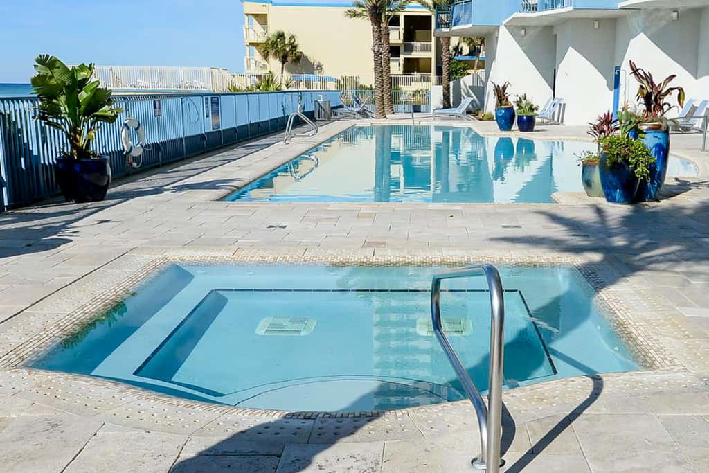 Gulf-front condo with balcony, beach access, hot tub, pool & gym