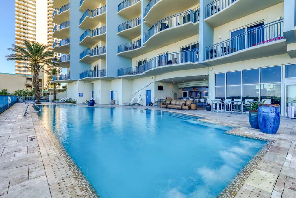 Gulf-front condo with balcony, beach access, hot tub, pool & gym