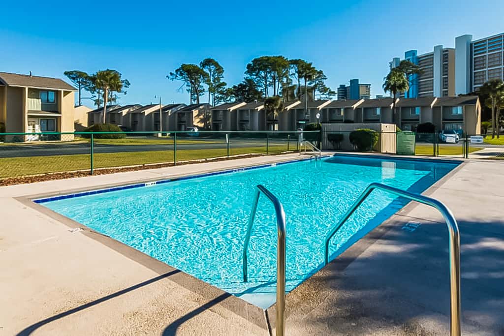 Dog-friendly townhome with beach access, pool, tennis, gym, WD, & central AC