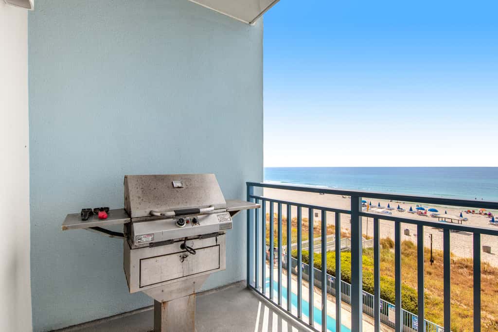 Gulf-front condo with seasonal beach service, pool, hot tub & gym