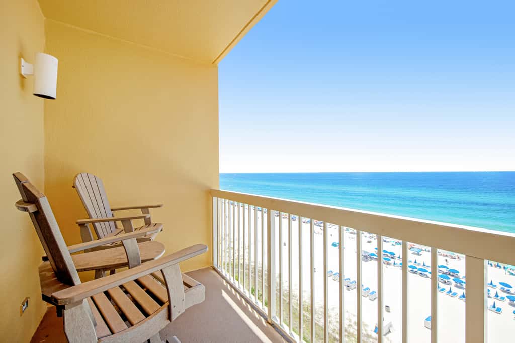 Gulf-front condo with beautiful sunset views, pool, tiki bar, fitness room & W&D