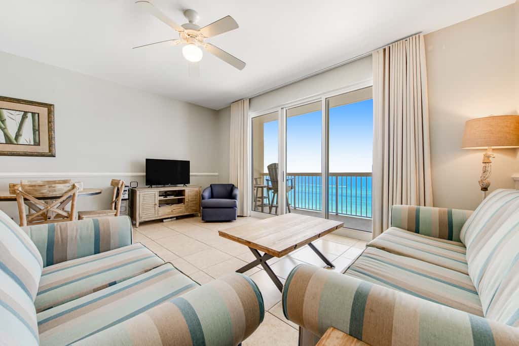 Gulf-front condo with beautiful sunset views, pool, tiki bar, fitness room & W&D