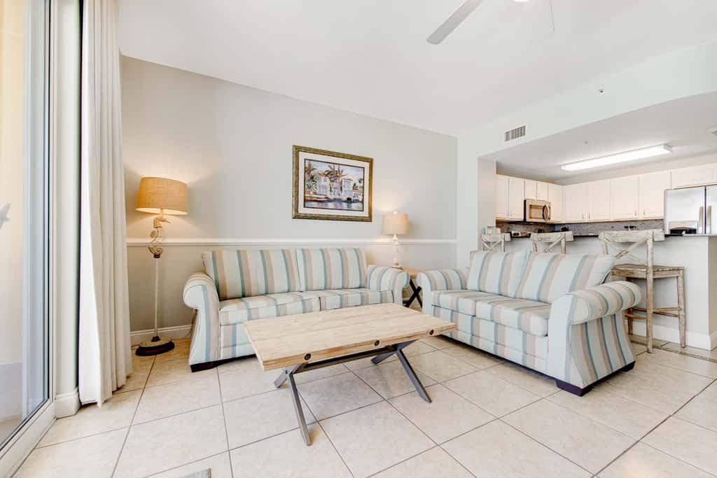 Gulf-front condo with beautiful sunset views, pool, tiki bar, fitness room & W&D