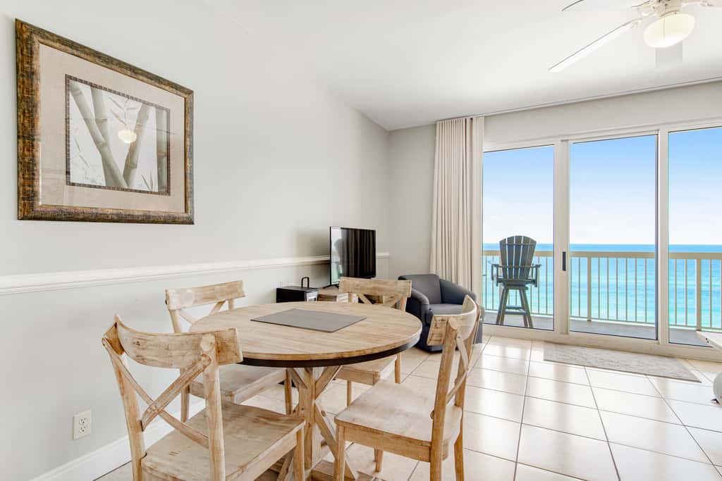 Gulf-front condo with beautiful sunset views, pool, tiki bar, fitness room & W&D