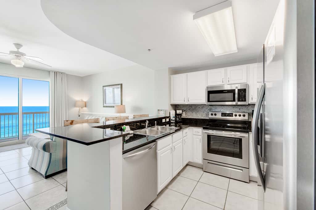 Gulf-front condo with beautiful sunset views, pool, tiki bar, fitness room & W&D