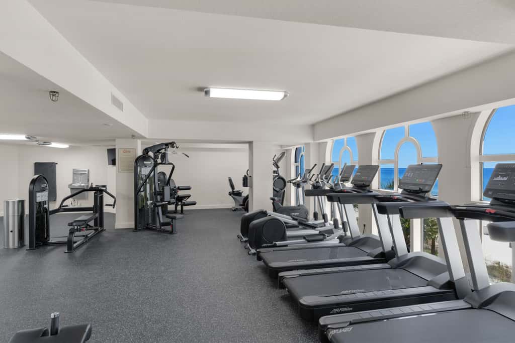 Gulf-front condo with beautiful sunset views, pool, tiki bar, fitness room & W&D