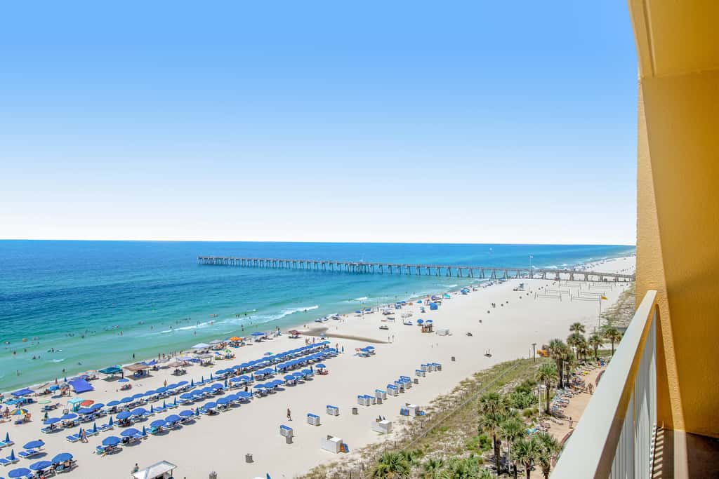 Gulf-front condo with beautiful sunset views, pool, tiki bar, fitness room & W&D