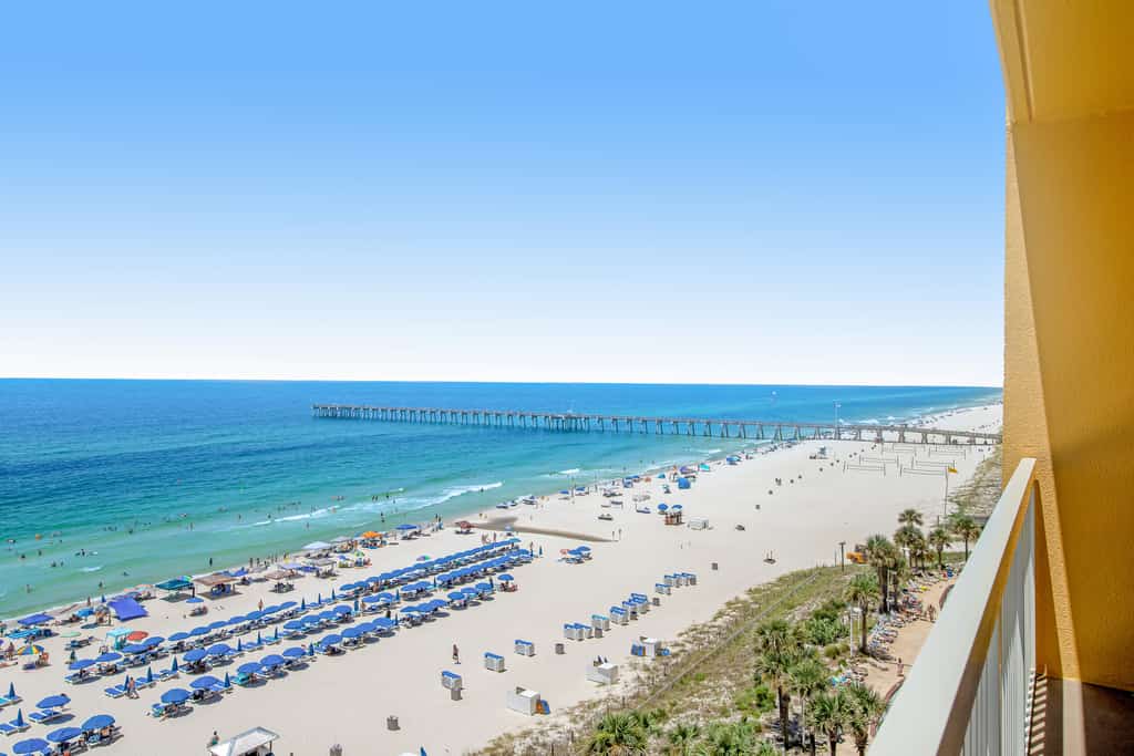 Gulf-front condo with beautiful sunset views, pool, tiki bar, fitness room & W&D