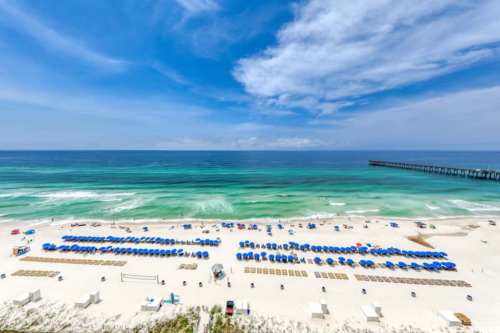 Beach-view, high-rise condo with pool - central location