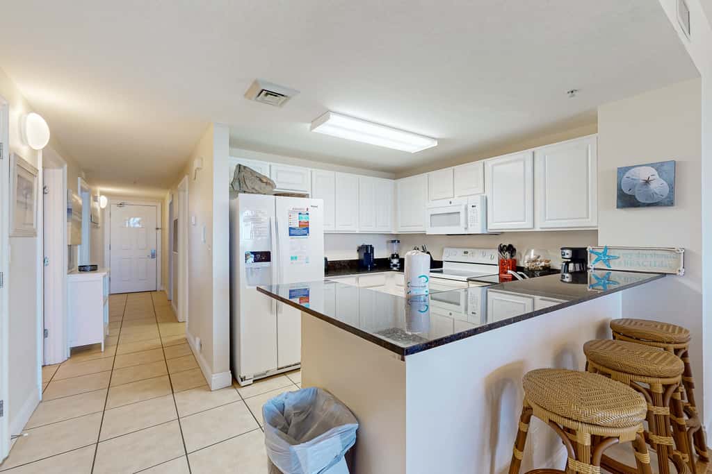 Tropical touches abound with balcony, pools, gym & beach access