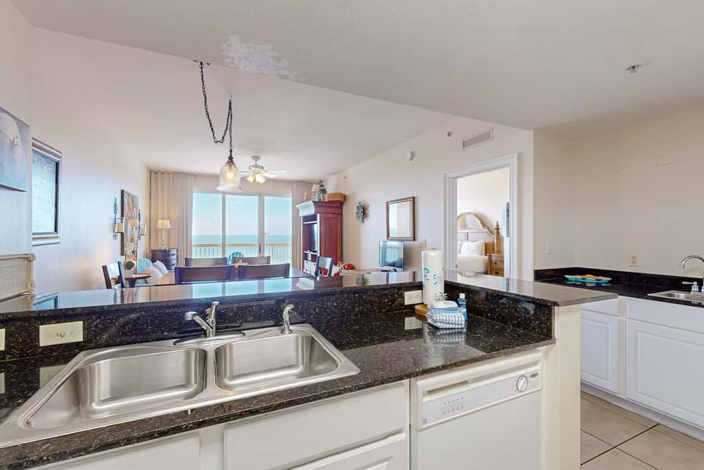 Tropical touches abound with balcony, pools, gym & beach access
