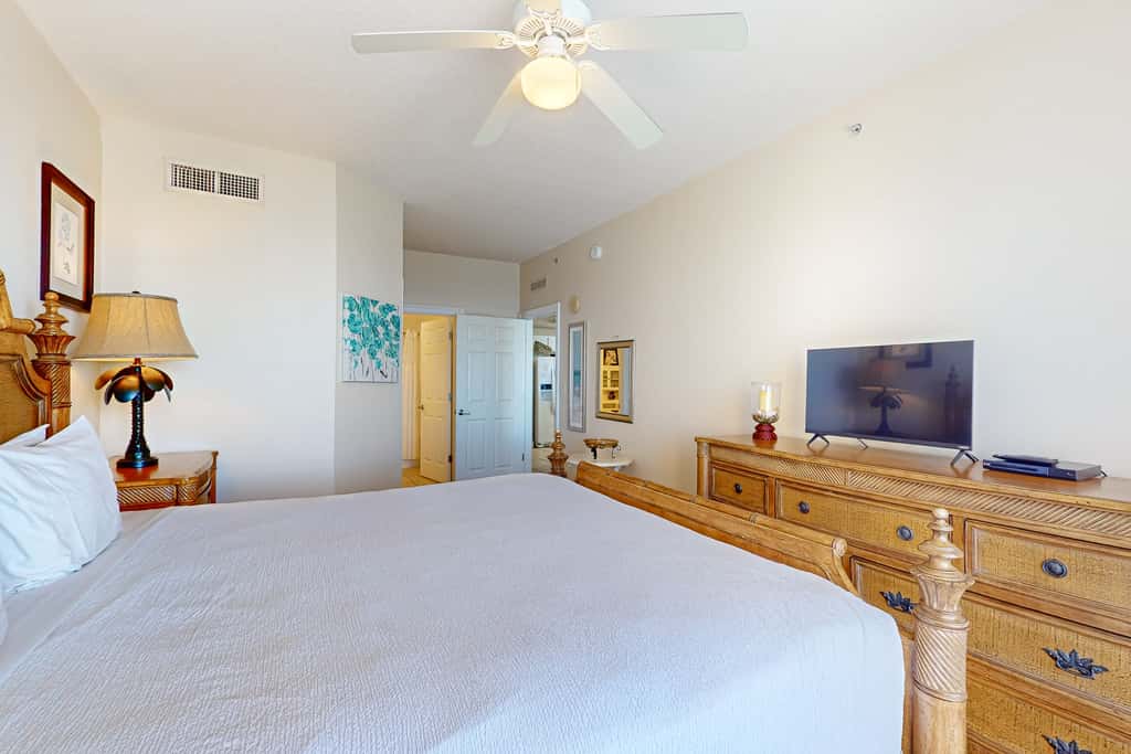 Tropical touches abound with balcony, pools, gym & beach access