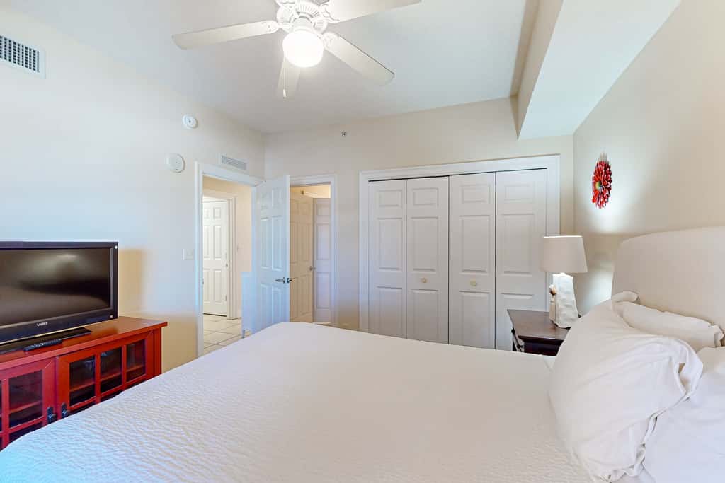 Tropical touches abound with balcony, pools, gym & beach access