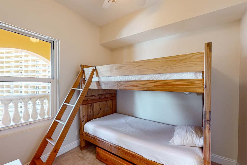 Tropical touches abound with balcony, pools, gym & beach access