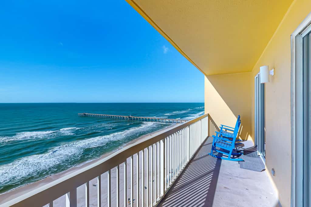 Tropical touches abound with balcony, pools, gym & beach access