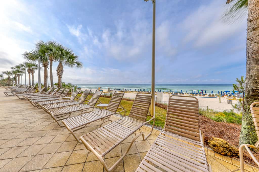Tropical touches abound with balcony, pools, gym & beach access