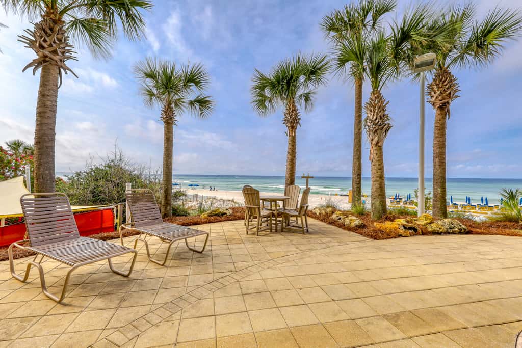 Tropical touches abound with balcony, pools, gym & beach access