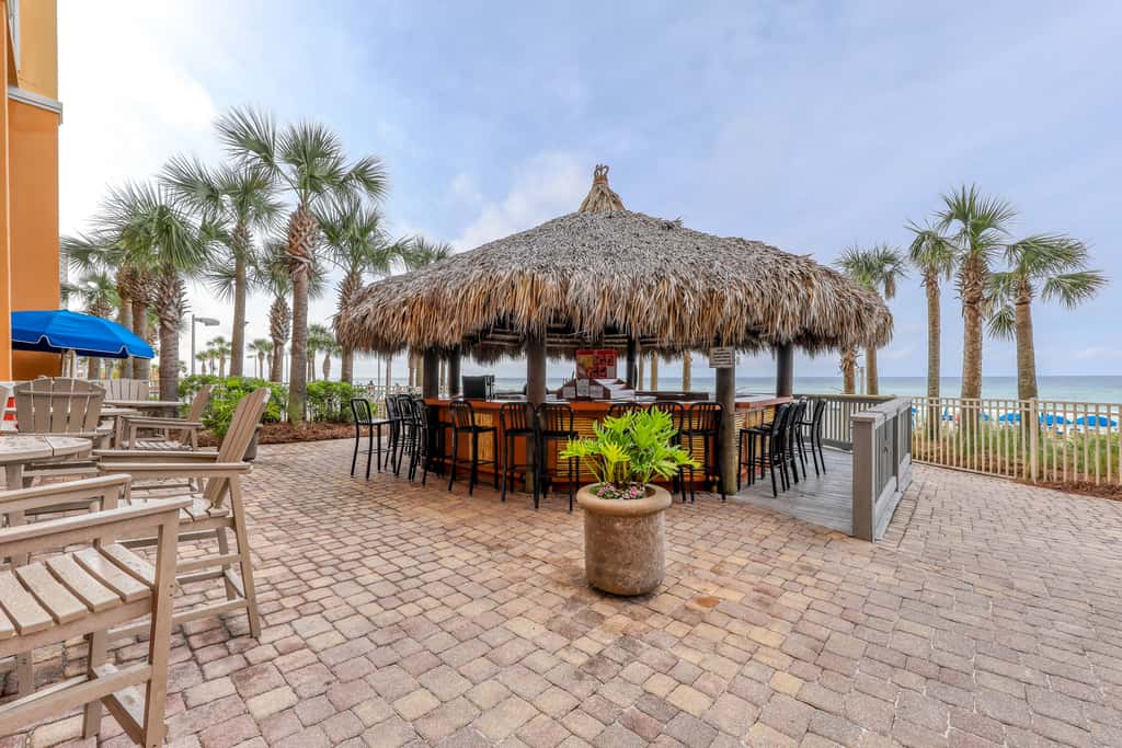 Waterfront condo with balcony, pools, gym & central AC