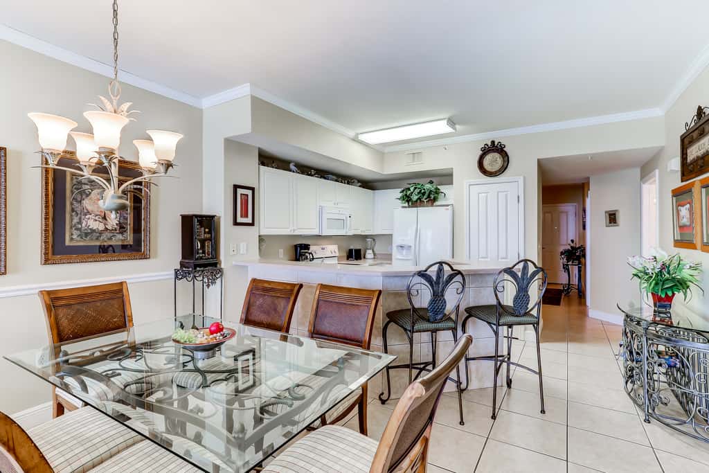 Eclectic gulf front condo with free WiFI, two pools, hot tub, & easy beach access