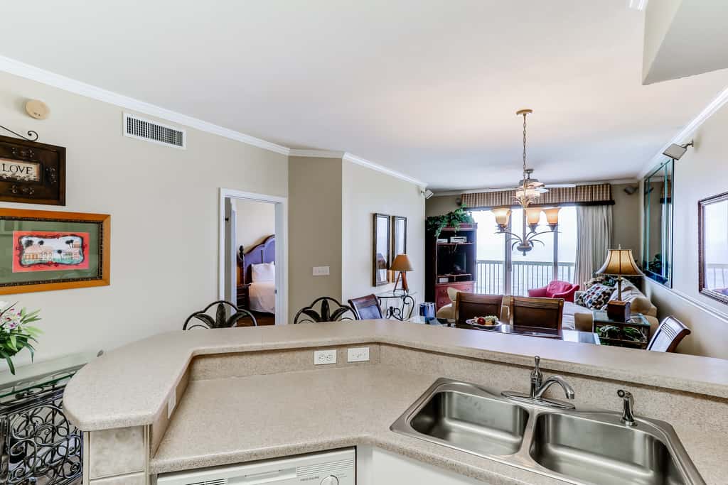 Eclectic gulf front condo with free WiFI, two pools, hot tub, & easy beach access