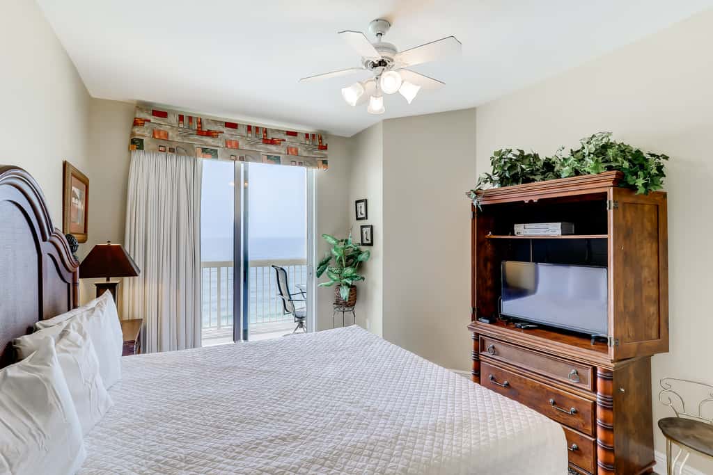 Eclectic gulf front condo with free WiFI, two pools, hot tub, & easy beach access