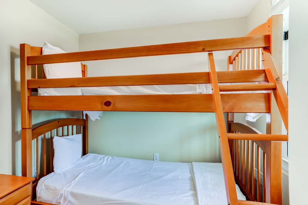 Eclectic gulf front condo with free WiFI, two pools, hot tub, & easy beach access