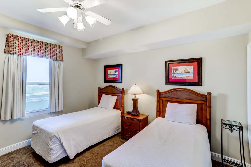 Eclectic gulf front condo with free WiFI, two pools, hot tub, & easy beach access