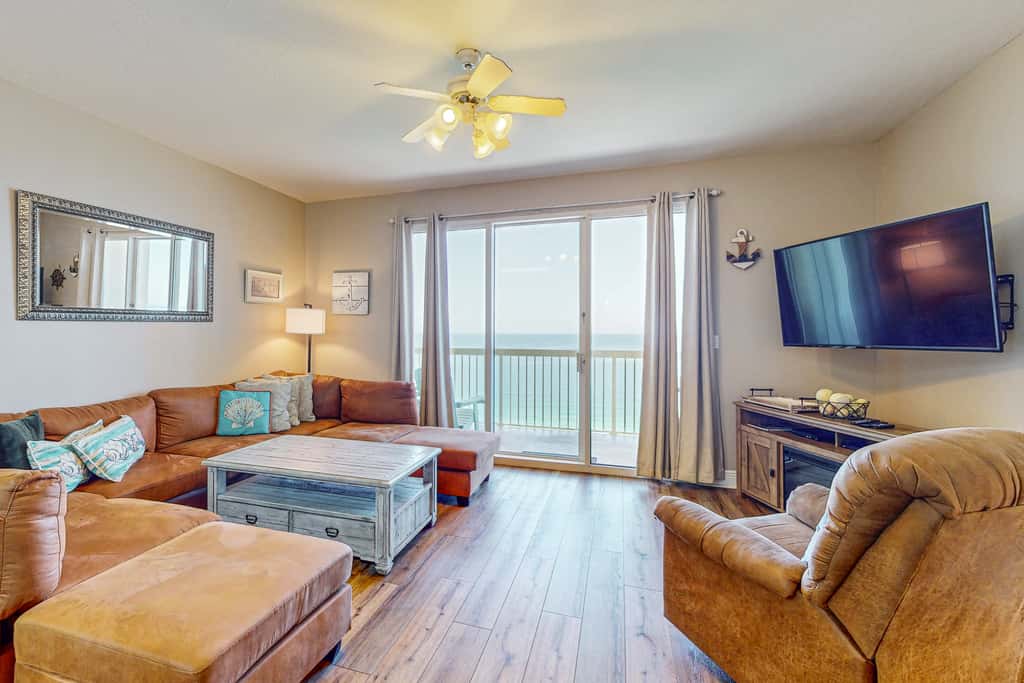 Beachy oceanfront condo with beach access, shared pools and hot tub, & free WiFi