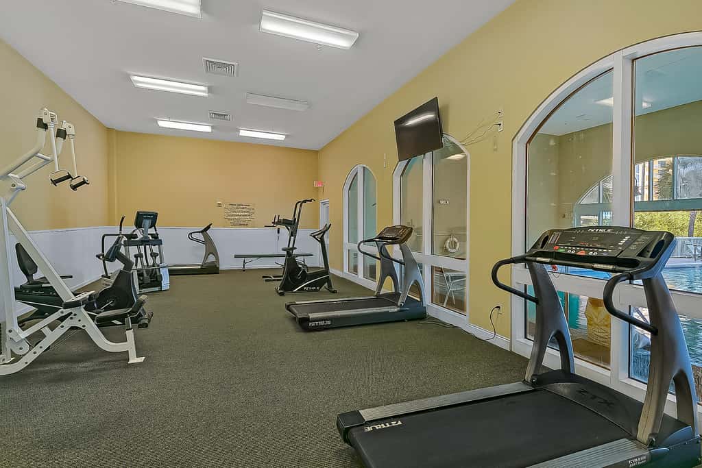 Beachy oceanfront condo with beach access, shared pools and hot tub, & free WiFi