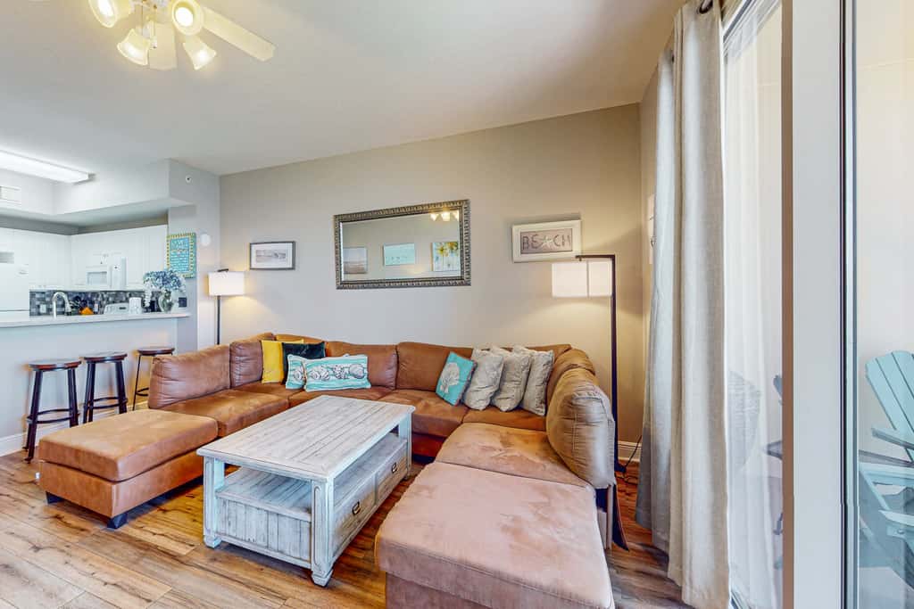 Beachy oceanfront condo with beach access, shared pools and hot tub, & free WiFi