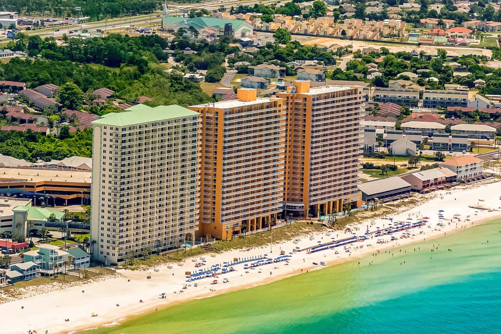 Beachy oceanfront condo with beach access, shared pools and hot tub, & free WiFi