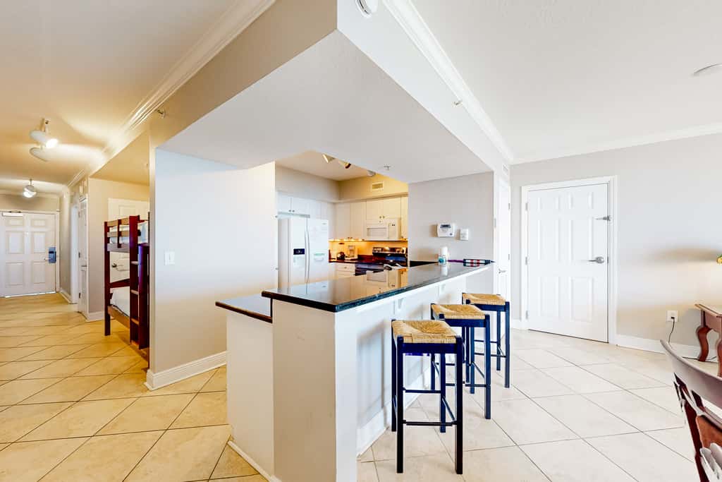 Beachfront 16th-floor condo with Gulf views, pool, game room, balcony, gym, W&D