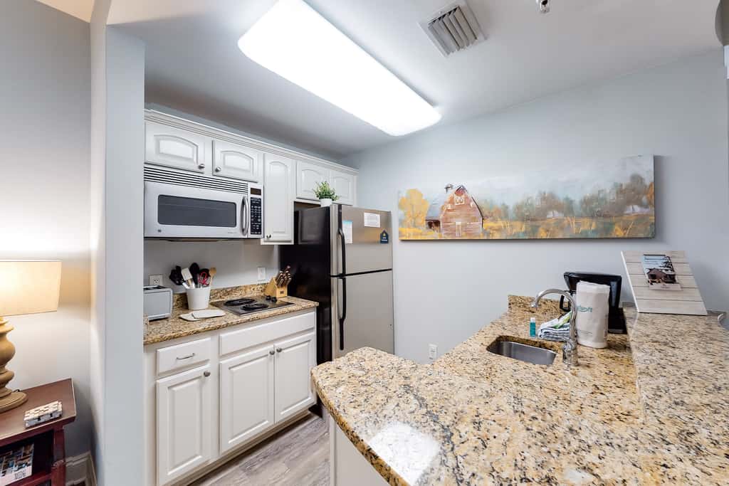 Stylish condo with lake views, bike rentals, & pools - walk to the beach