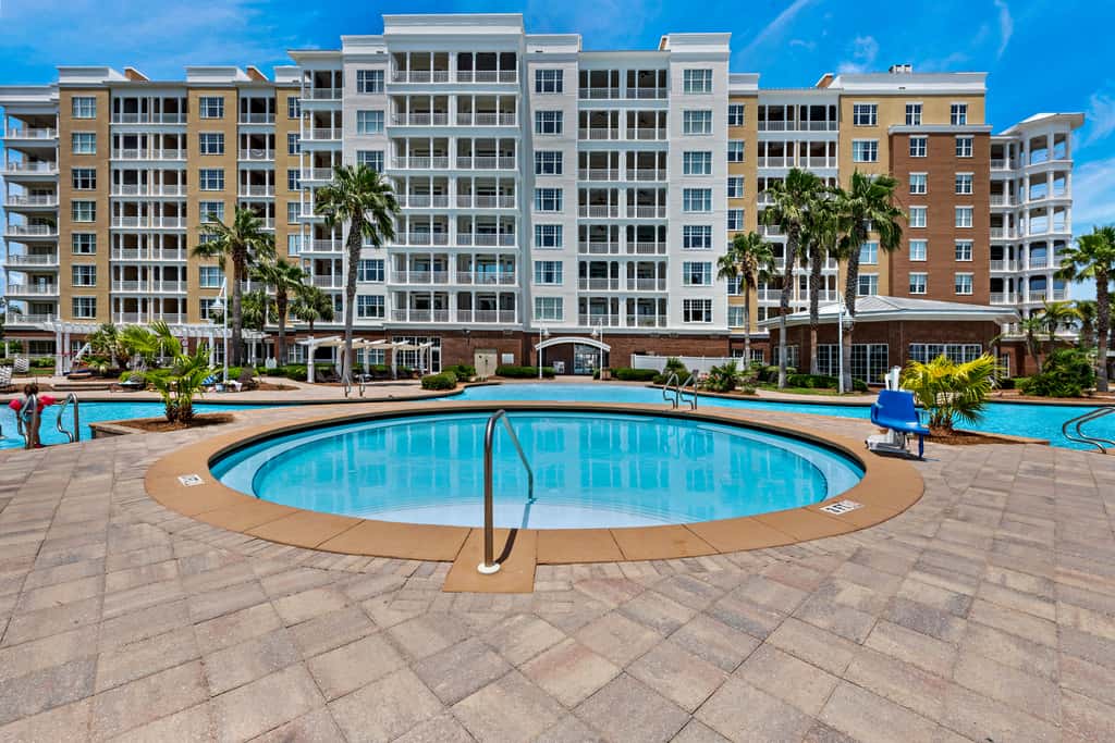 Luxurious bayfront condo in a gated resort with an amazing pool & hot tub