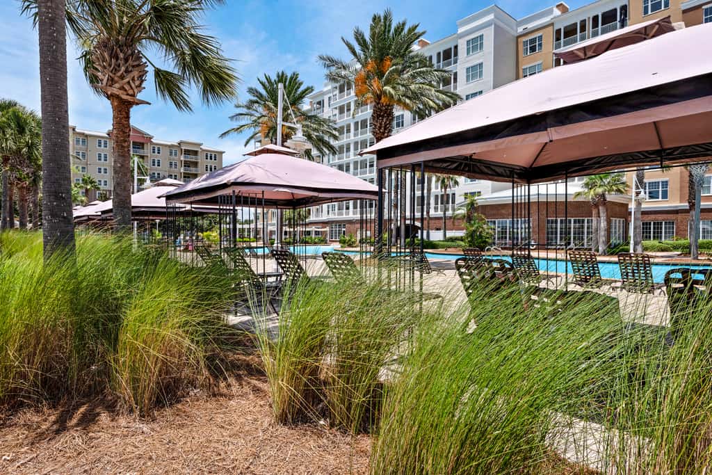Luxurious bayfront condo in a gated resort with an amazing pool & hot tub