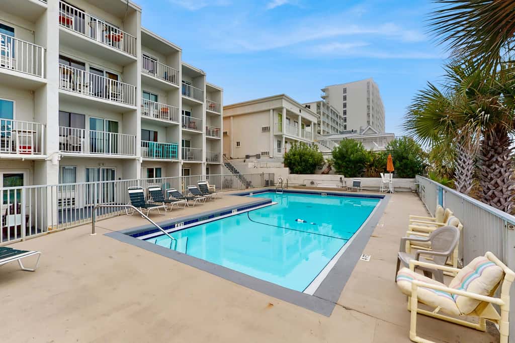 Dog-friendly beachfront condo with pool, hot tub, AC, & Gulf views