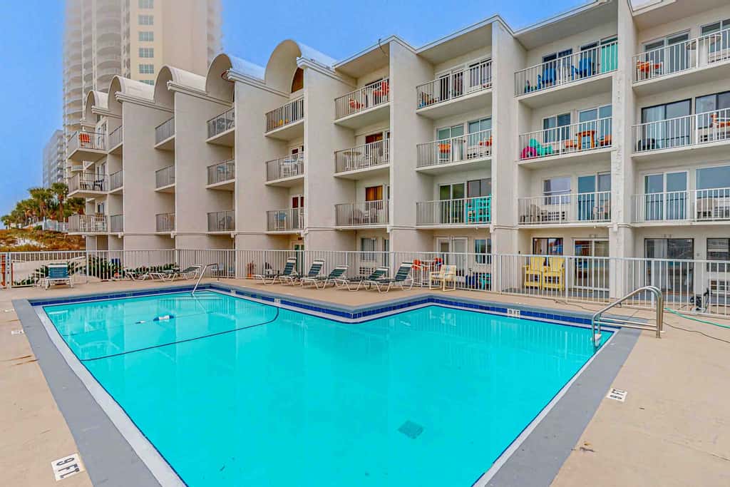Dog-friendly beachfront condo with pool, hot tub, AC, & Gulf views
