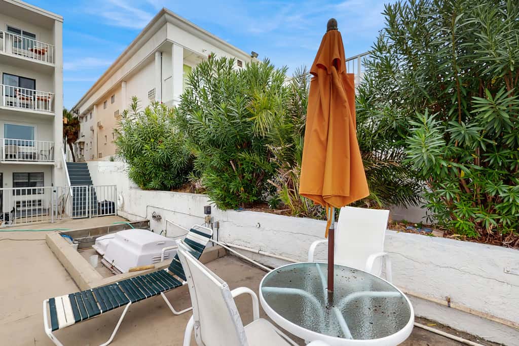 Dog-friendly beachfront condo with pool, hot tub, AC, & Gulf views