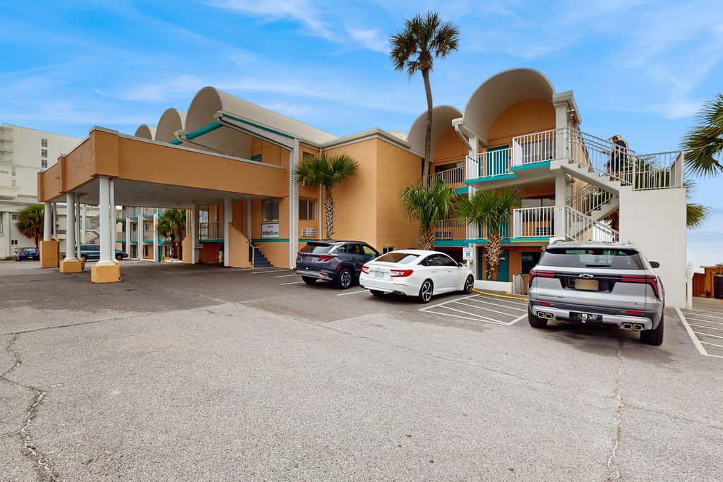 Dog-friendly beachfront condo with pool, hot tub, AC, & Gulf views
