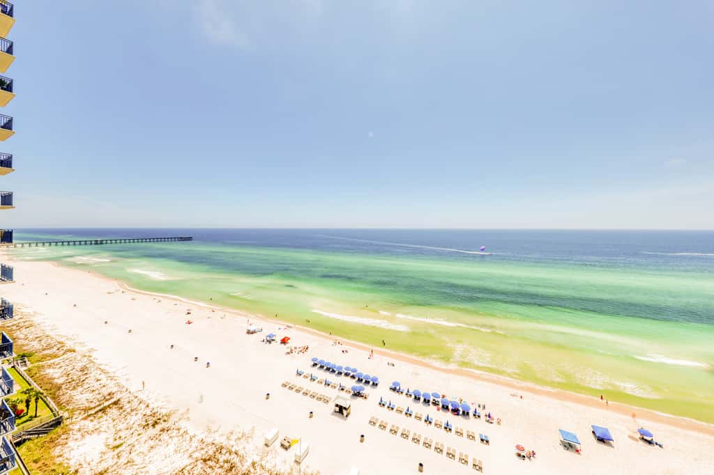 Beachfront condo with Gulf views, access to beach, large pool, hot tub & gym