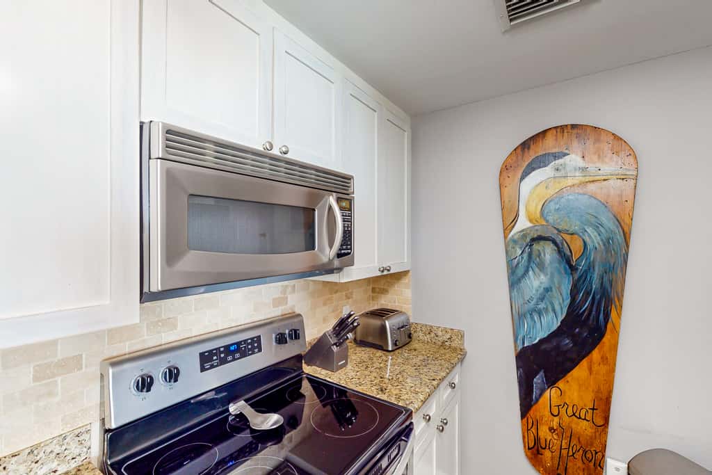 16th-floor condo with Gulf views, beach access, 2 pools, hot tub, & private W&D