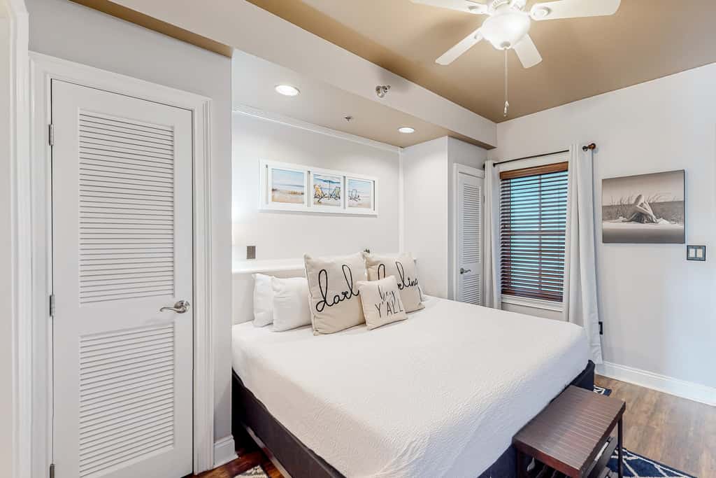 Water-view condo with on-site pool, hot tub, beachfront access, & sports courts