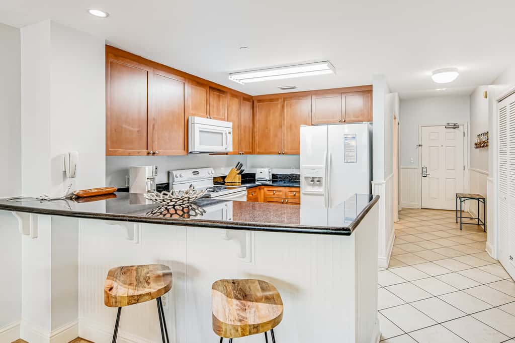 Renovated oceanfront condo with pools, hot tub & AC