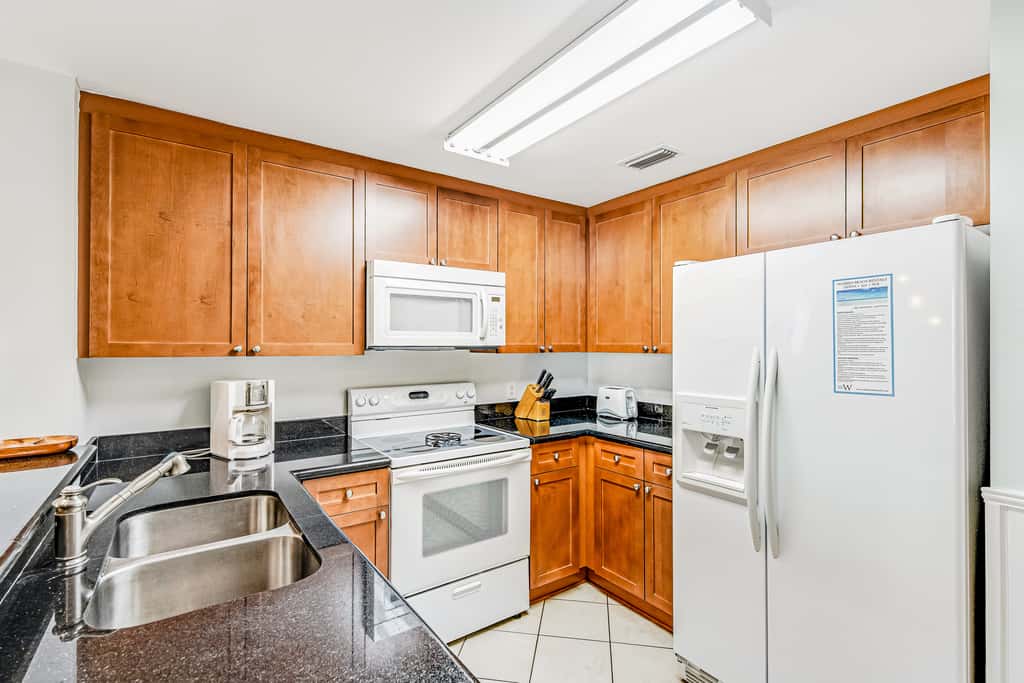 Renovated oceanfront condo with pools, hot tub & AC